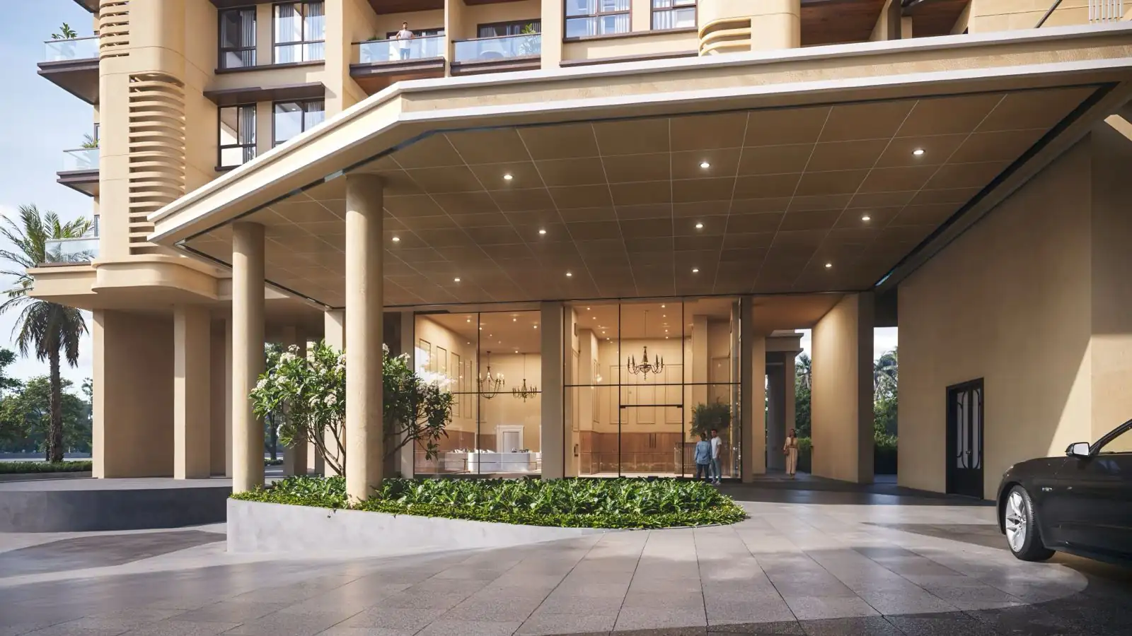Grand porte-cochere arrival with a chandelier-lit entrance